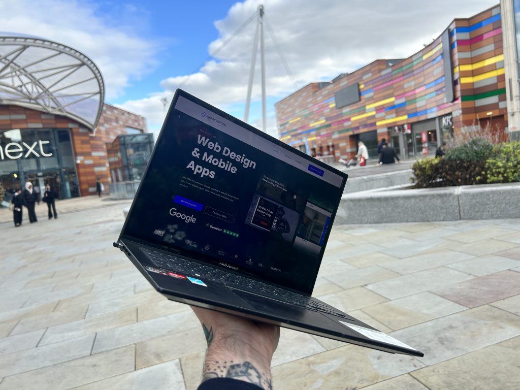 Newport Web Design - Laptop in Shopping mall